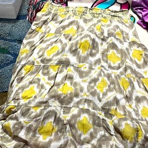 This is a cute skirt. It goes below the knees. I didn’t really wear it.